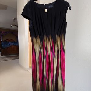 Black with green pink and purple design on lower h